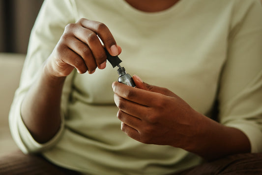 woman holds nail polish
